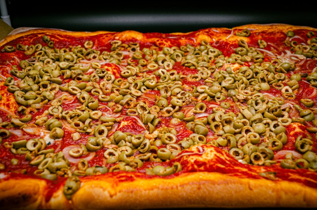 Plaque de pizza olives oignons